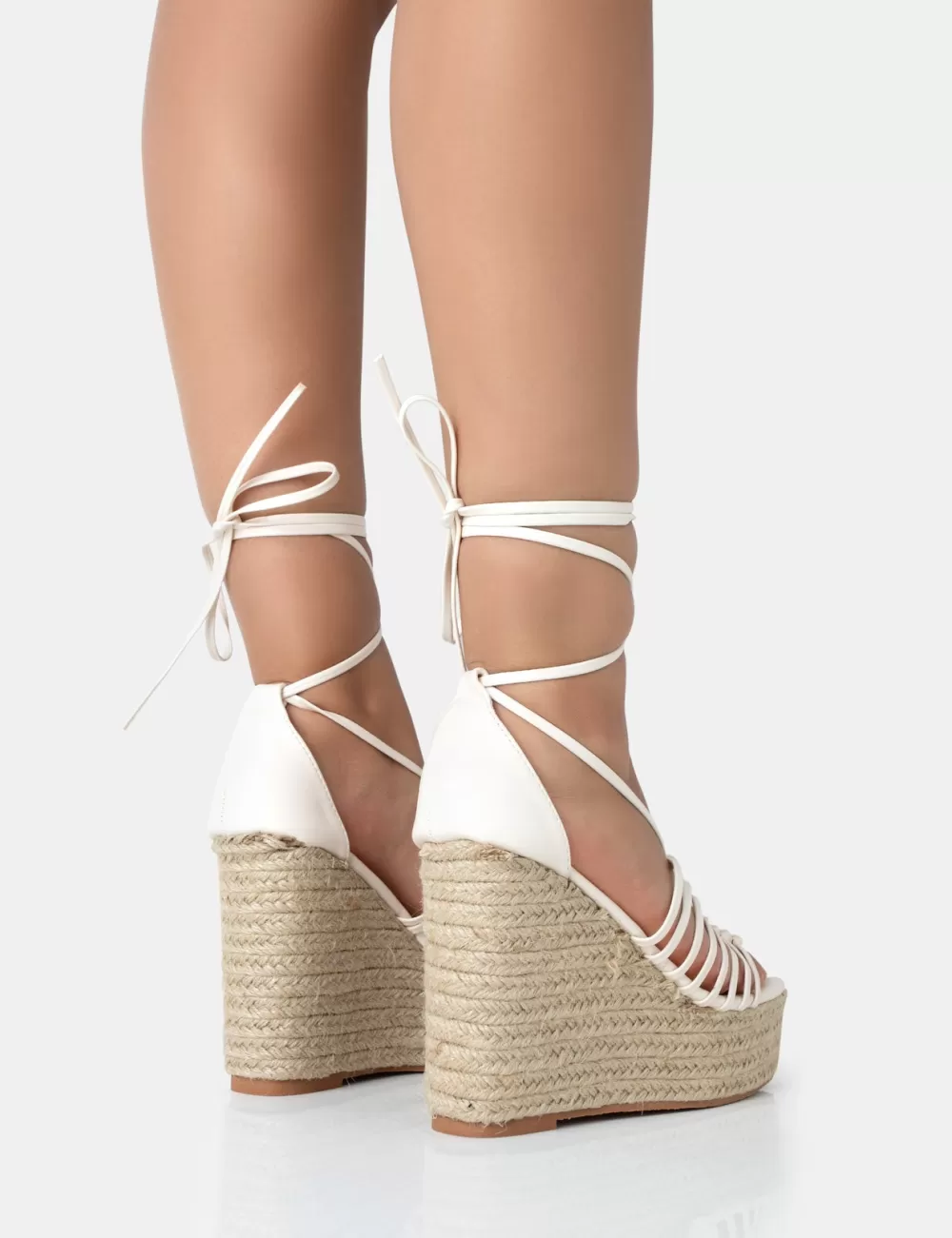 Shop Public Desire Reece Wide Fit Ecru Pu Knot Strap Lace Up Raffia Wedge Heels Neutral